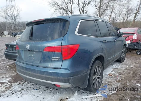 2017 Honda Pilot Touring z USA, uszkodzony, nr VIN 5FNYF6H95HB028638